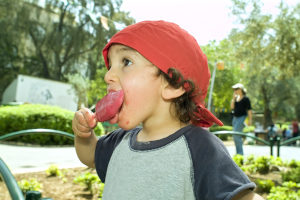 Kid eating popsicle